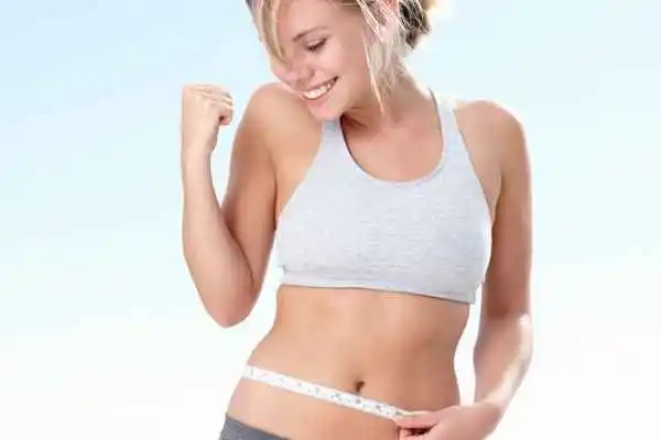 woman happy after fat reduction treatment Altrincham