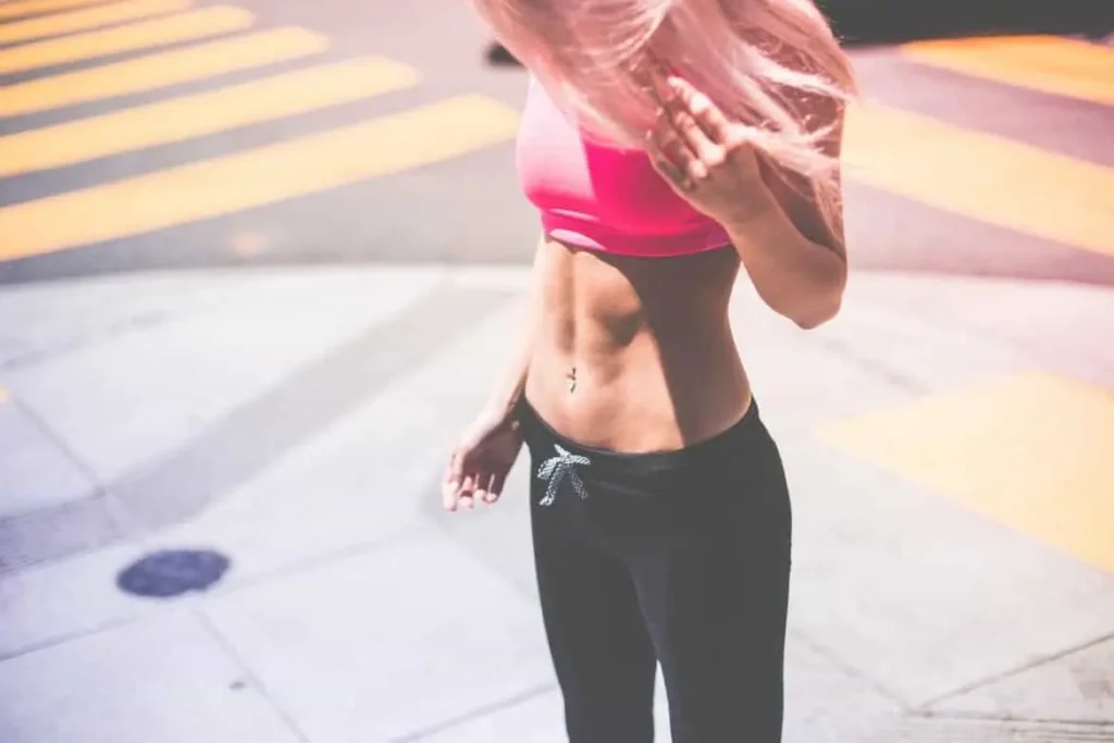Woman with toned stomach after LA-EMS Body Sculpting Treatment Altrincham
